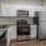 a kitchen with white cabinets