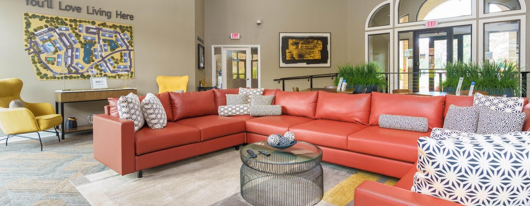 a living room with a red couch