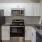 a kitchen with white cabinets